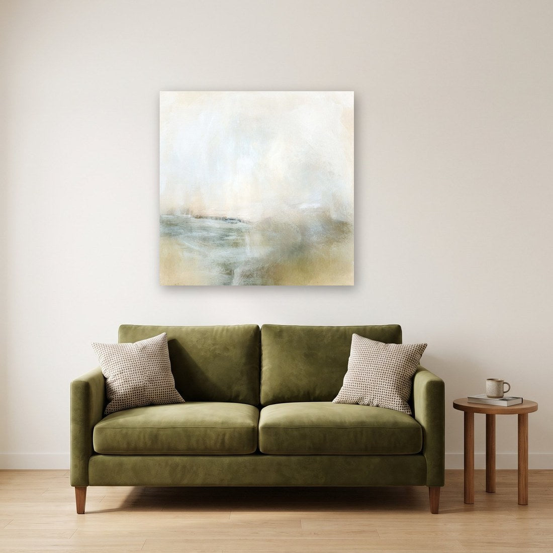 Living room with a large abstract canvas above a green sofa