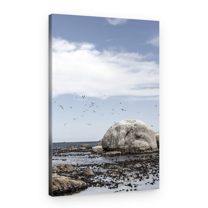 Rocky Seashore Under A Clear Sky – Canvas Print