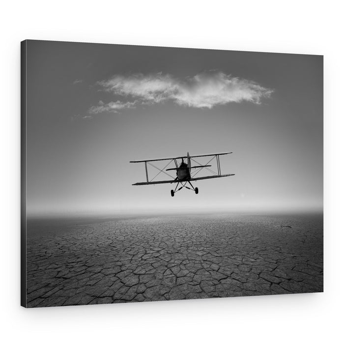 Biplane Over Cracked Earth – Canvas Print