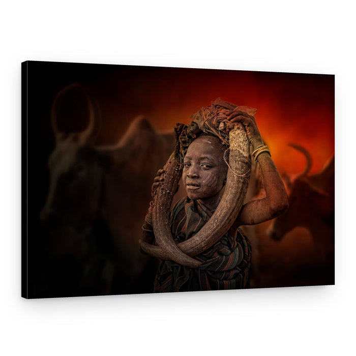 African Youth Carrying Horns – Canvas Print