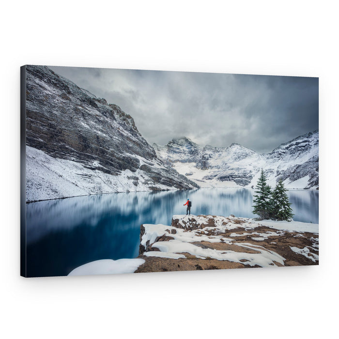 Hiker At Snowy Lake – Canvas Print