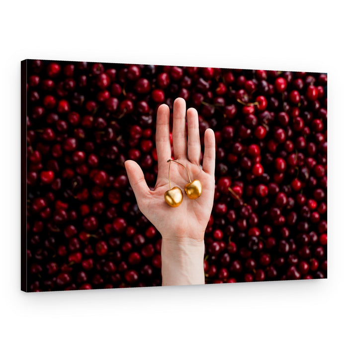 Hand Holding Golden Cherries – Canvas Print